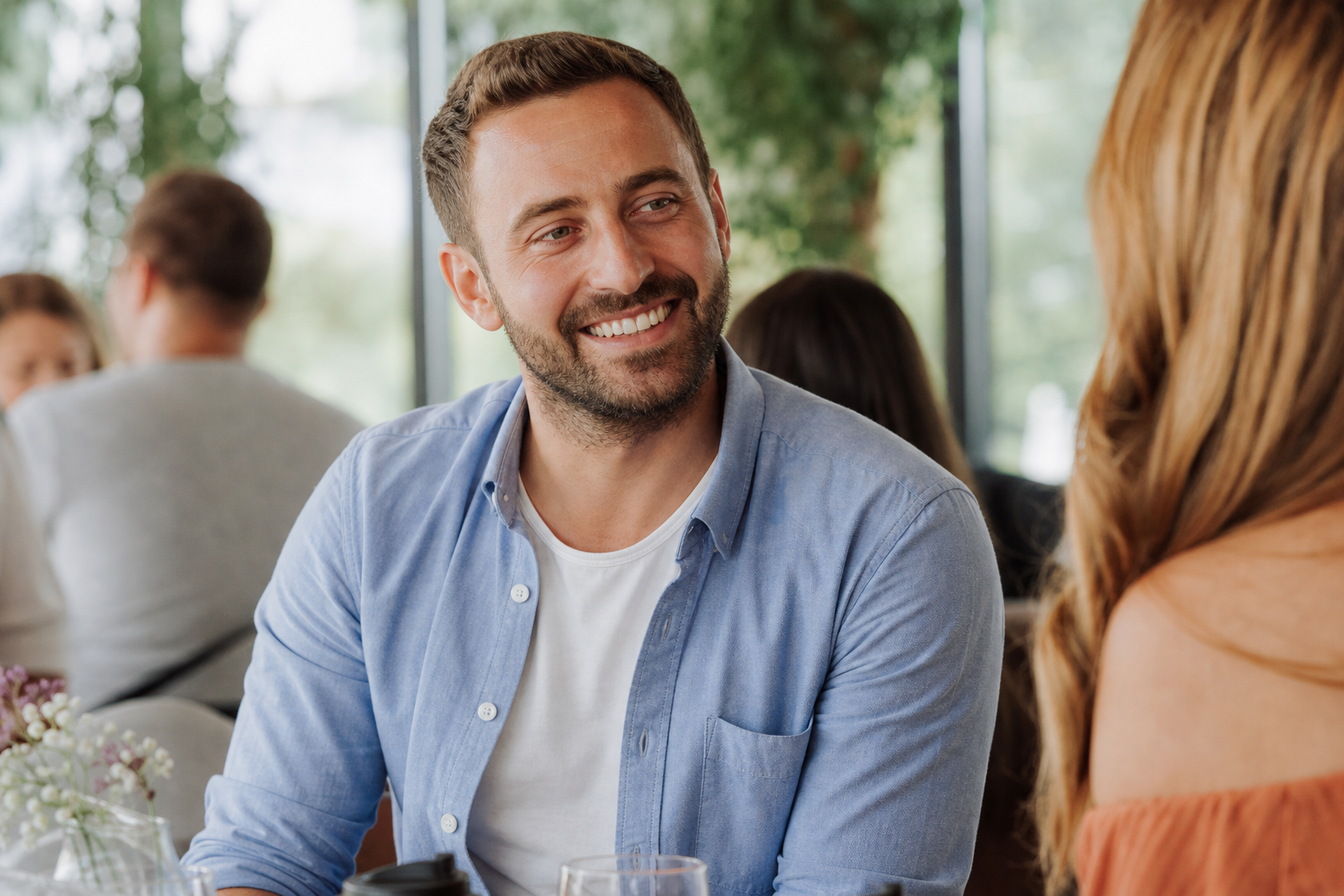 Dental Corner patient in a modern consultation room discussing veneer treatment options with a dentist