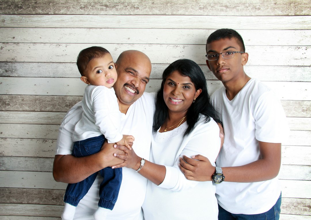 Smiling family at their Edmonton dental clinic