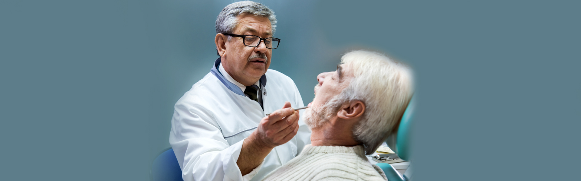 Dentist in Ajax checking patient.