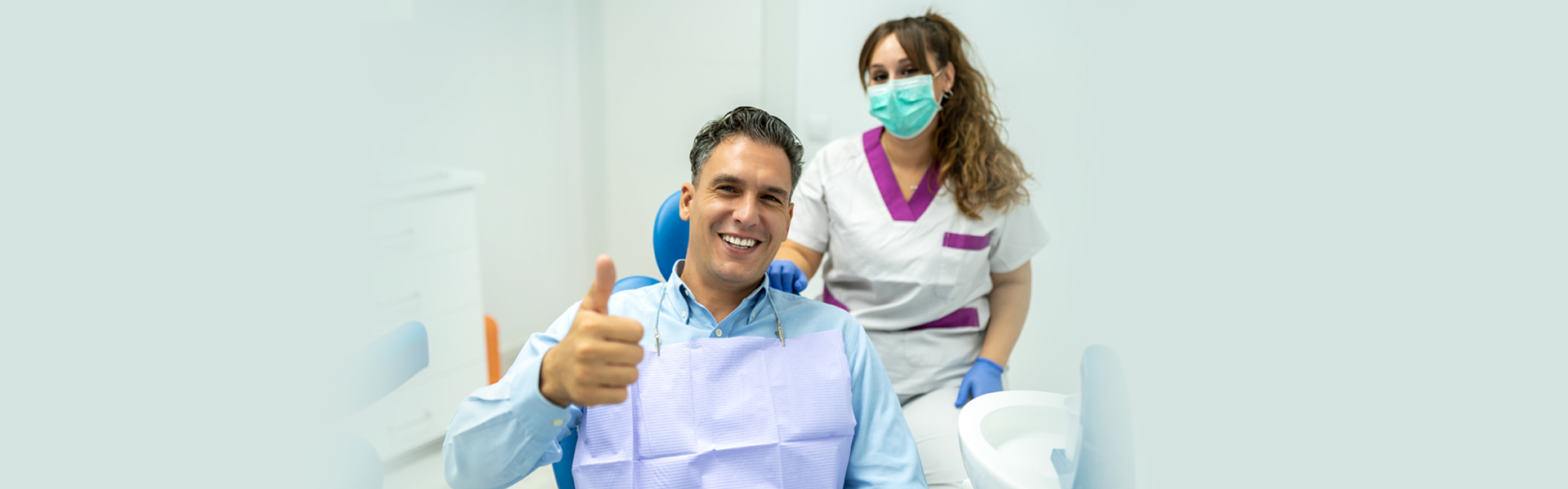 Happy dental patient with Ajax dentist
