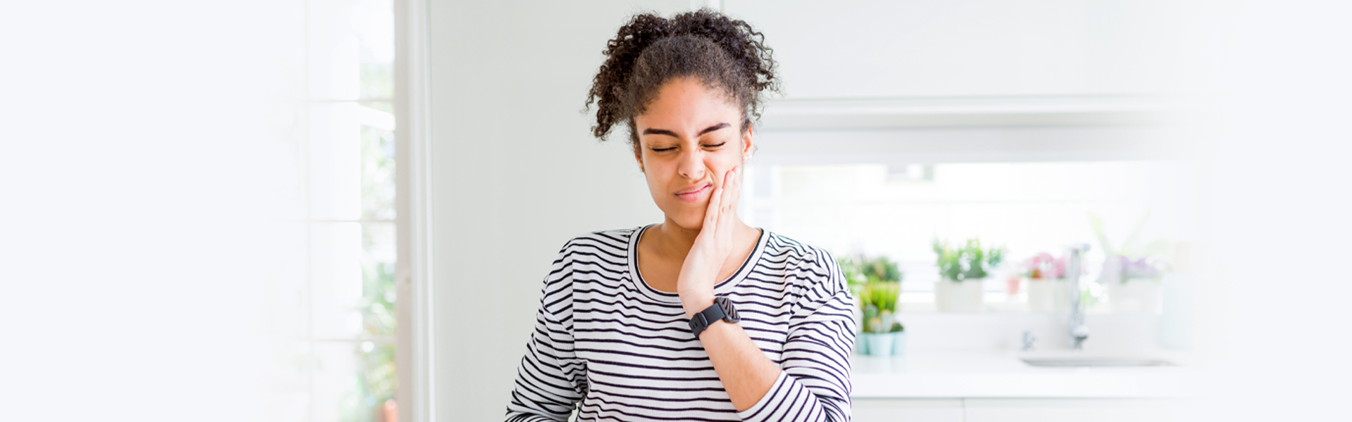 Girl in dental pain.