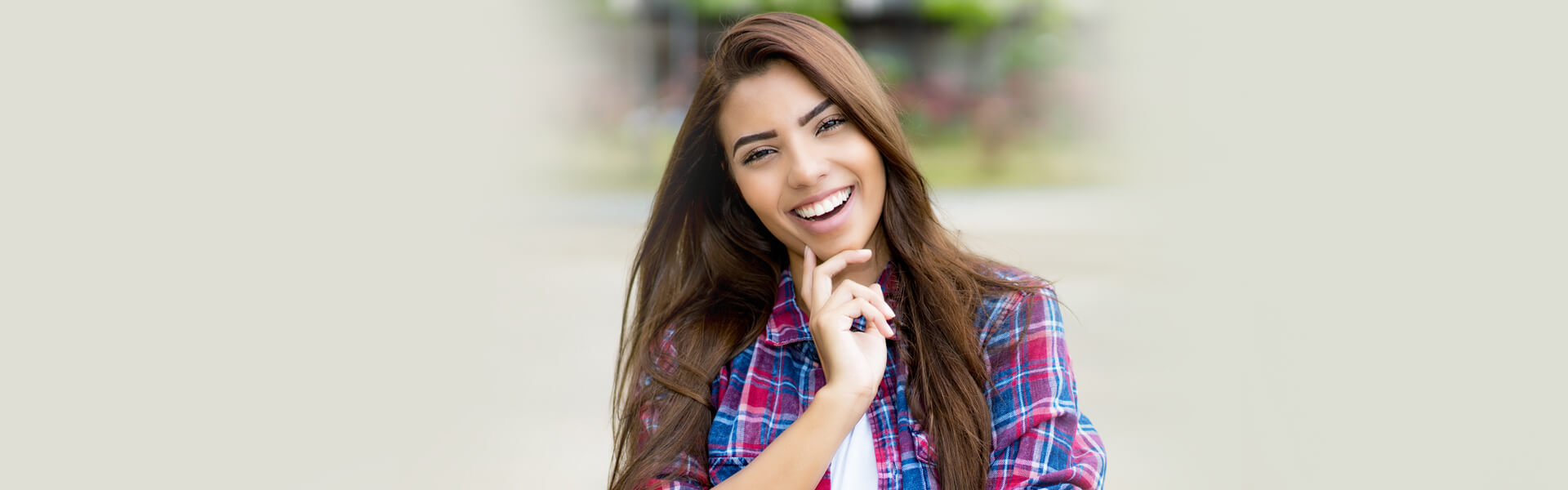 Girl with perfect smile after using SureSmile aligners in Ajax, Ontario.