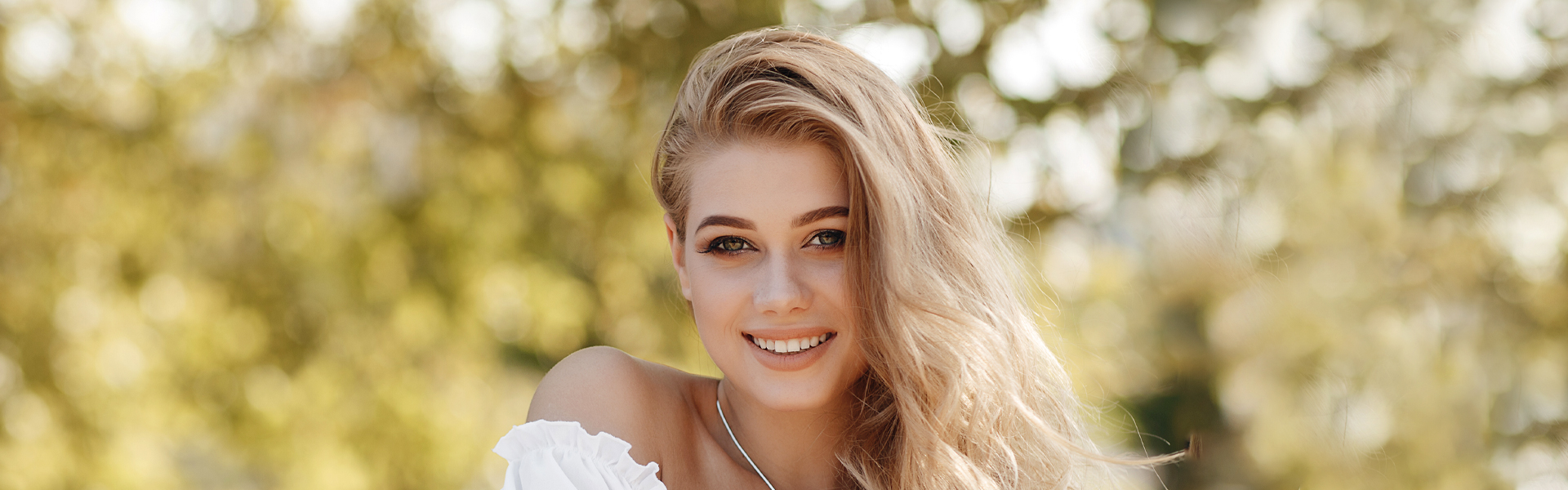 smiling girl after getting dental bridges in Ajax, ON