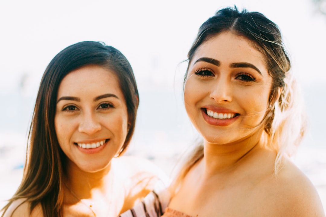 General dentist and patient smiling in a Calgary dental clinic