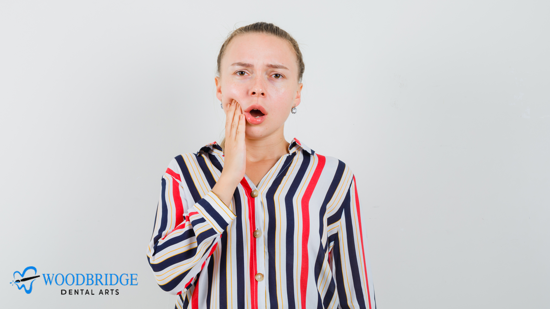 Why Your Tooth Hurts When You Bite Down: Common Causes and When to See a Woodbridge Dentist